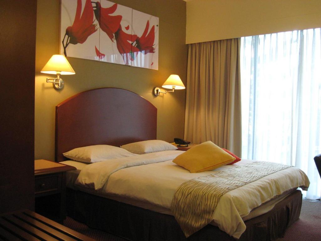 Casuarina Hotel Кота-Кінабалу Номер фото