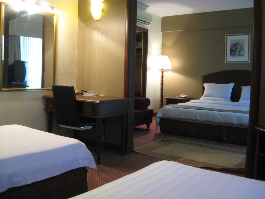 Casuarina Hotel Кота-Кінабалу Номер фото