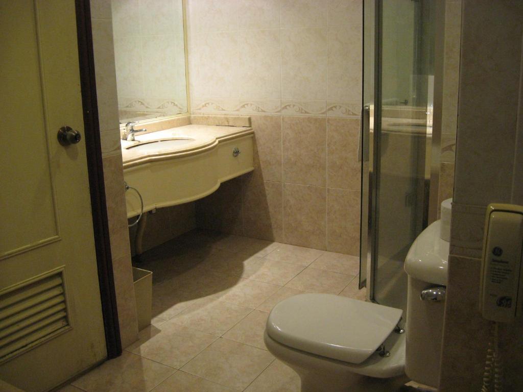 Casuarina Hotel Кота-Кінабалу Номер фото